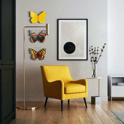 Three metal butterflies in indoor setting
